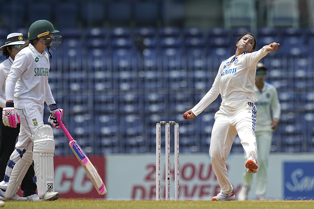 Sneh Rana bowls a delivery against South Africa